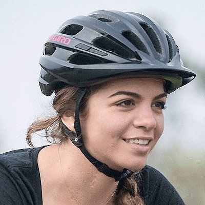 young woman cyclist wearing giro register helmet