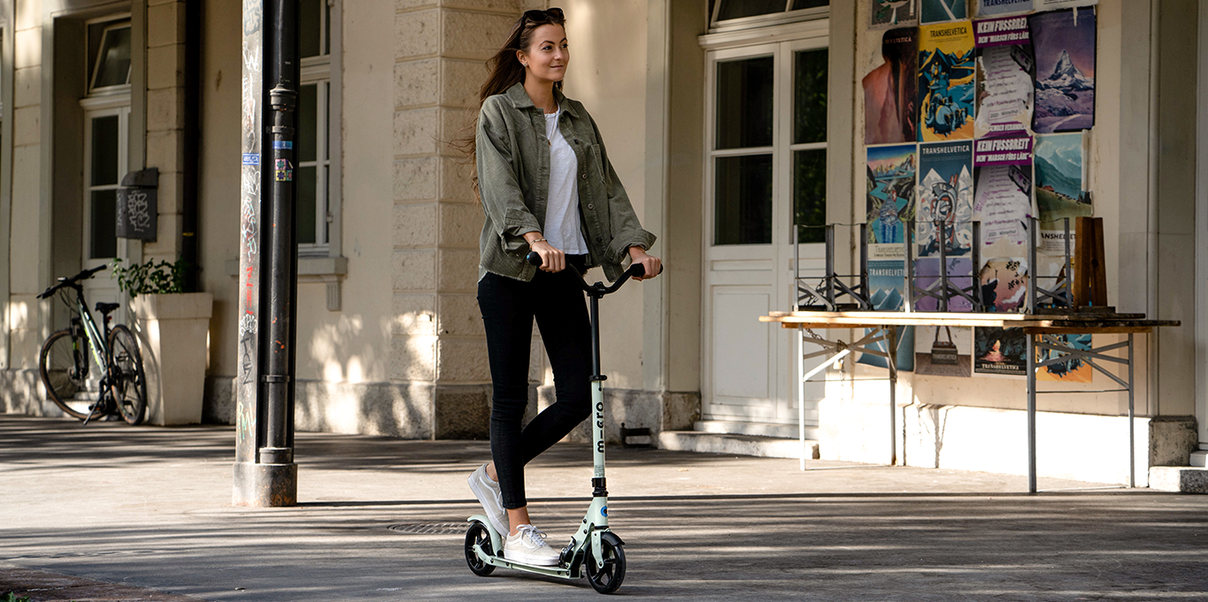 Micro Speed Deluxe Medium-Sized Kick Scooter with Bicycle-Style Handlebar