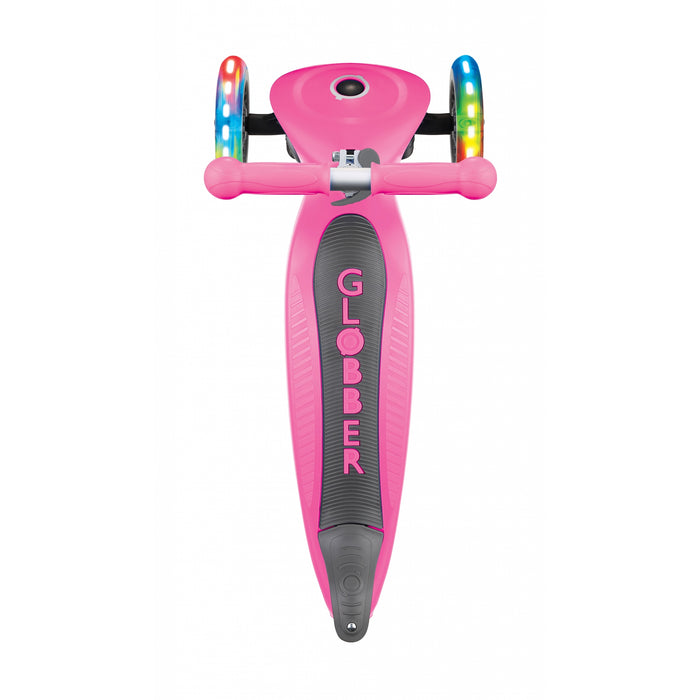 Globber Primo Lights foldable kick scooter, top view, in neon pink