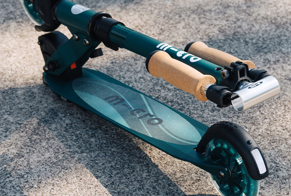 Micro Sprite ECO LED Green Two Wheel kick scooter made with sustainable parts