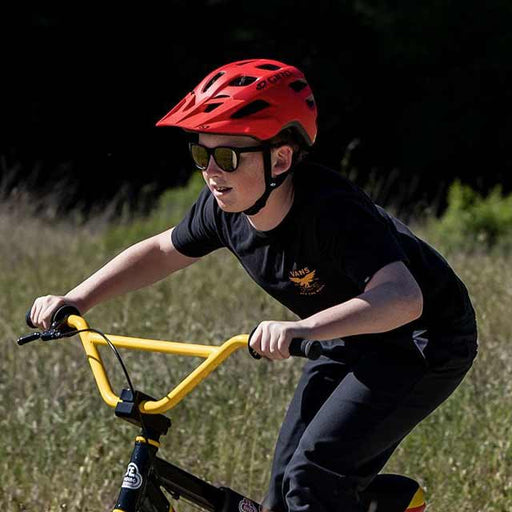 Boy wearing Giro Tremor bicycle helmet for youths